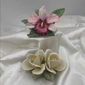 2 Porcelain Flowers.